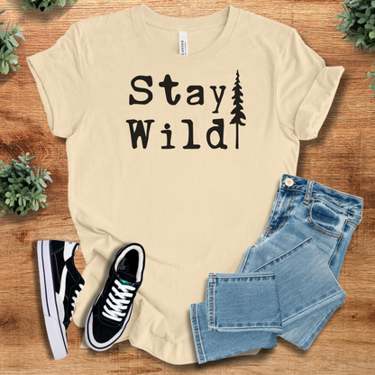 Athletic-heather t-shirt with '' text, flat lay styled on a wooden surface.