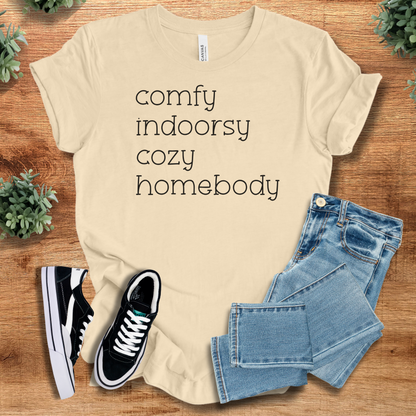 Heather-aqua t-shirt with '' text, flat lay styled on a wooden surface.