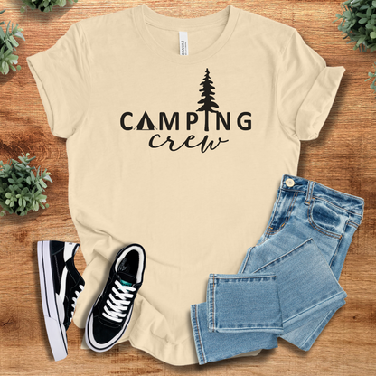 Heather-mauve t-shirt with '' text, flat lay styled on a wooden surface.