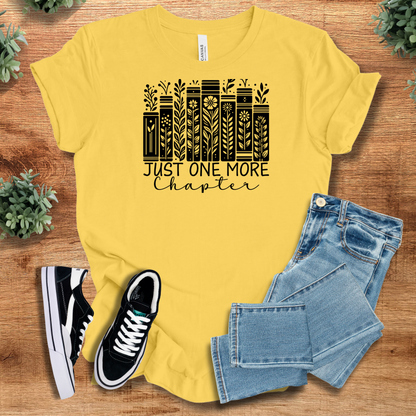Athletic-heather t-shirt with '' text, flat lay styled on a wooden surface.