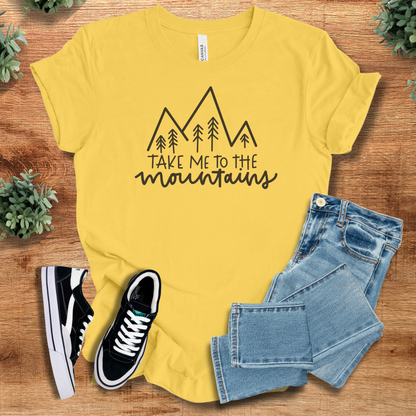 Athletic-heather t-shirt with '' text, flat lay styled on a wooden surface.