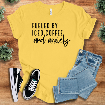 Athletic-heather t-shirt with '' text, flat lay styled on a wooden surface.