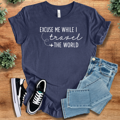 Heather-aqua t-shirt with '' text, flat lay styled on a wooden surface.