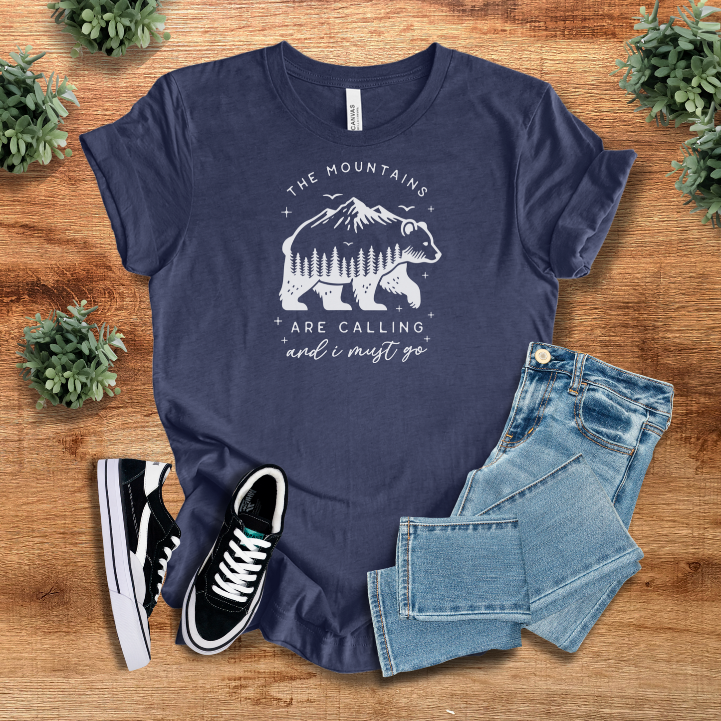 Navy blue mountain lover t-shirt featuring a scenic bear and nature-inspired design. A perfect casual outdoor wear for wanderlust travelers.