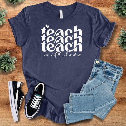 White t-shirt with '' text, flat lay styled on a wooden surface.