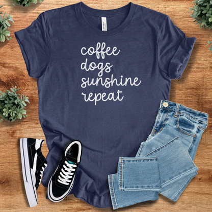 Heather-aqua t-shirt with '' text, flat lay styled on a wooden surface.