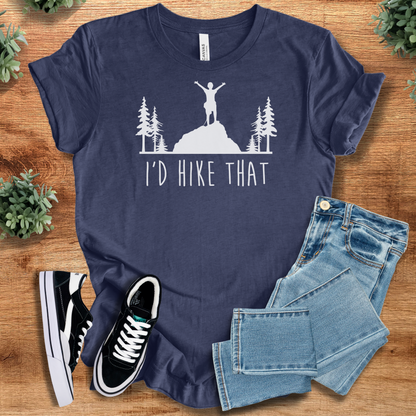 Heather-mauve t-shirt with '' text, flat lay styled on a wooden surface.