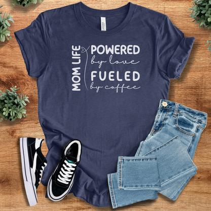 Heather-aqua t-shirt with '' text, flat lay styled on a wooden surface.