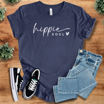 Heather-aqua t-shirt with '' text, flat lay styled on a wooden surface.