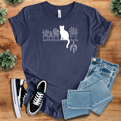 Heather-mauve t-shirt with '' text, flat lay styled on a wooden surface.