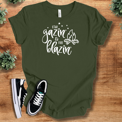 Heather-navy t-shirt with '' text, flat lay styled on a wooden surface.