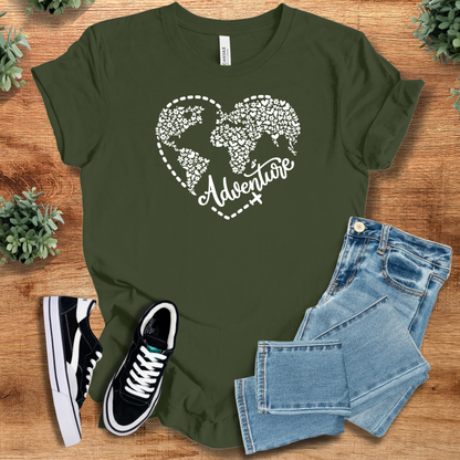Heather-mauve t-shirt with '' text, flat lay styled on a wooden surface.