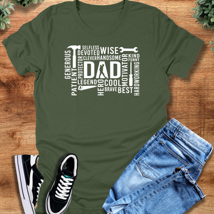 Black t-shirt with '' text, flat lay styled on a wooden surface.