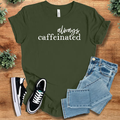 Heather-mauve t-shirt with '' text, flat lay styled on a wooden surface.
