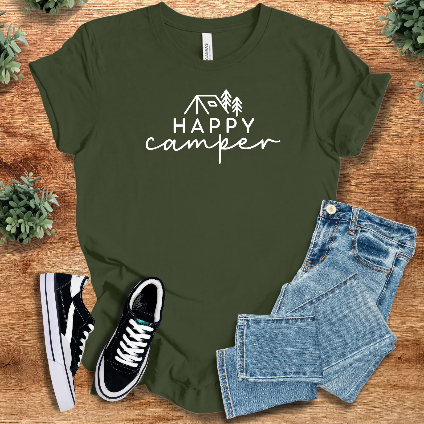 Heather-aqua t-shirt with '' text, flat lay styled on a wooden surface.