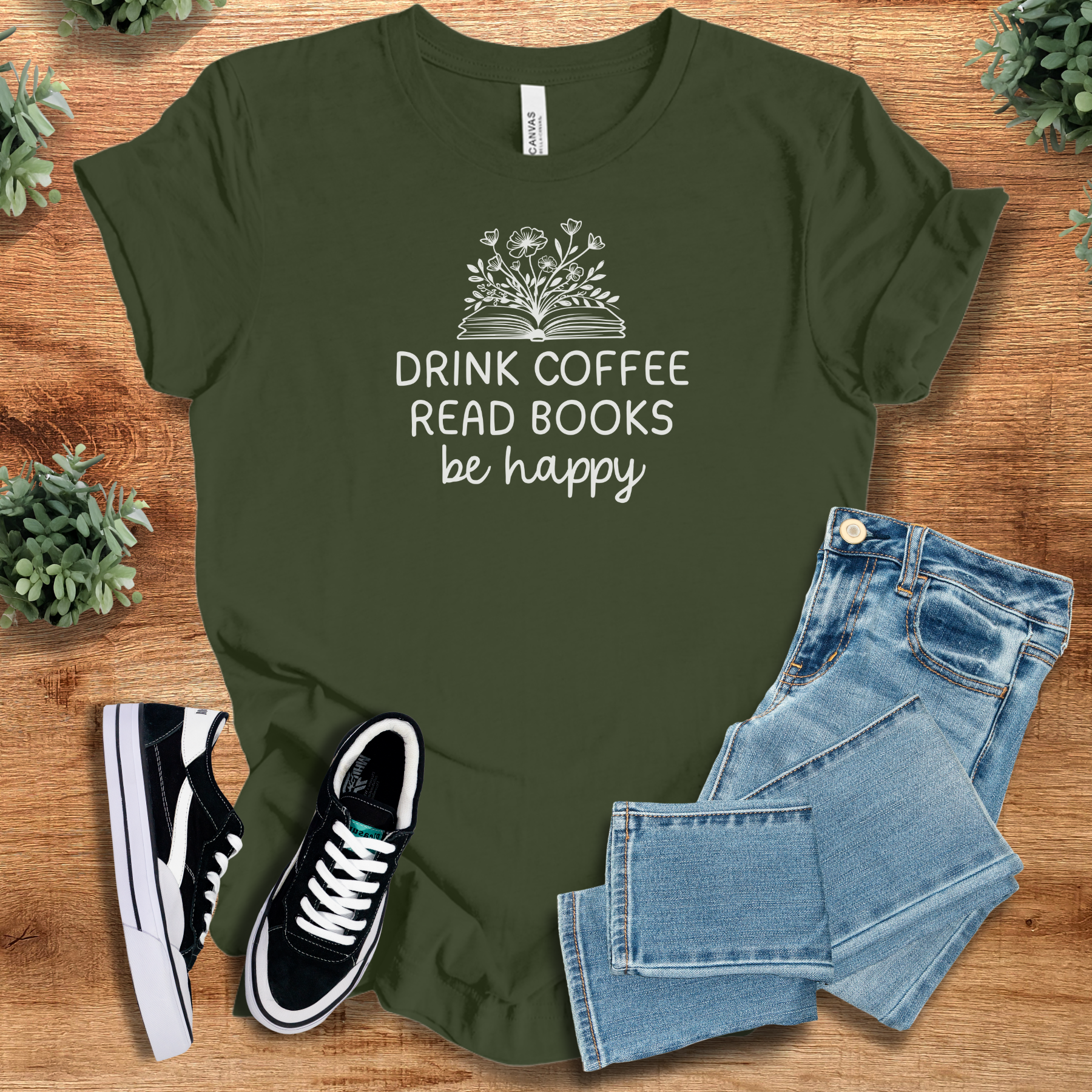 Soft-cream t-shirt with '' text, flat lay styled on a wooden surface.