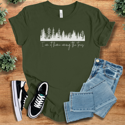 Soft-cream t-shirt with '' text, flat lay styled on a wooden surface.