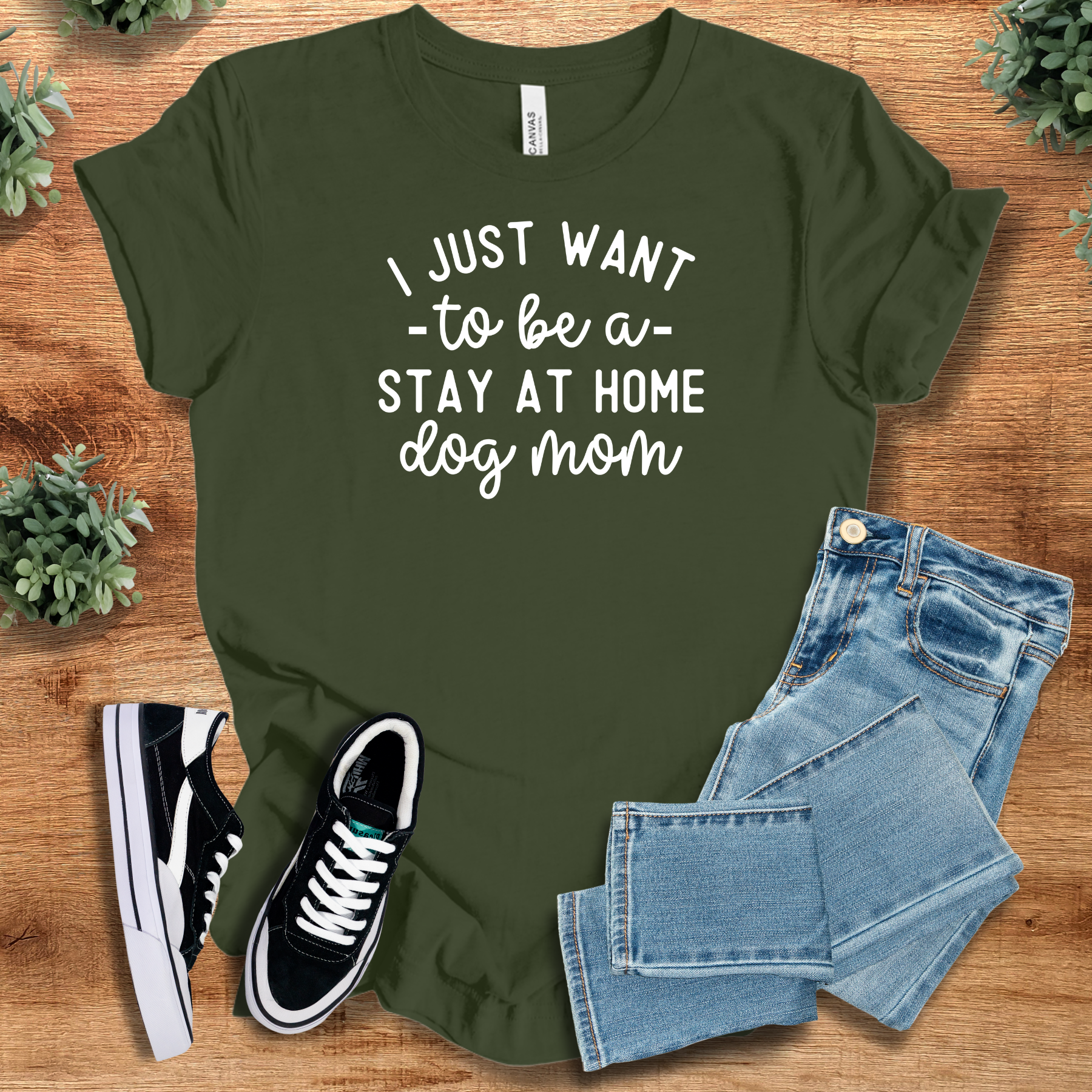 Soft-cream t-shirt with '' text, flat lay styled on a wooden surface.