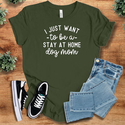 Soft-cream t-shirt with '' text, flat lay styled on a wooden surface.