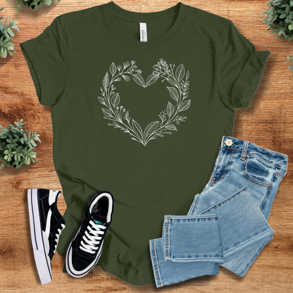 Soft-cream t-shirt with '' text, flat lay styled on a wooden surface.