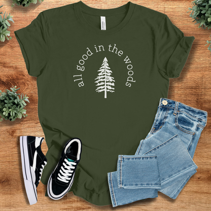 Heather-navy t-shirt with '' text, flat lay styled on a wooden surface.