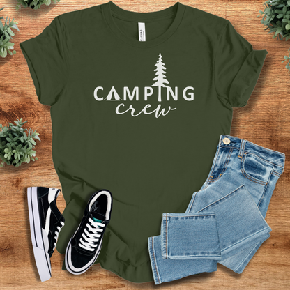 Yellow t-shirt with '' text, flat lay styled on a wooden surface.