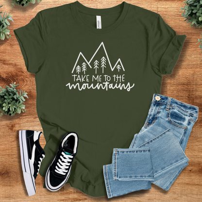 Soft-cream t-shirt with '' text, flat lay styled on a wooden surface.