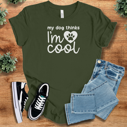 Heather-aqua t-shirt with '' text, flat lay styled on a wooden surface.