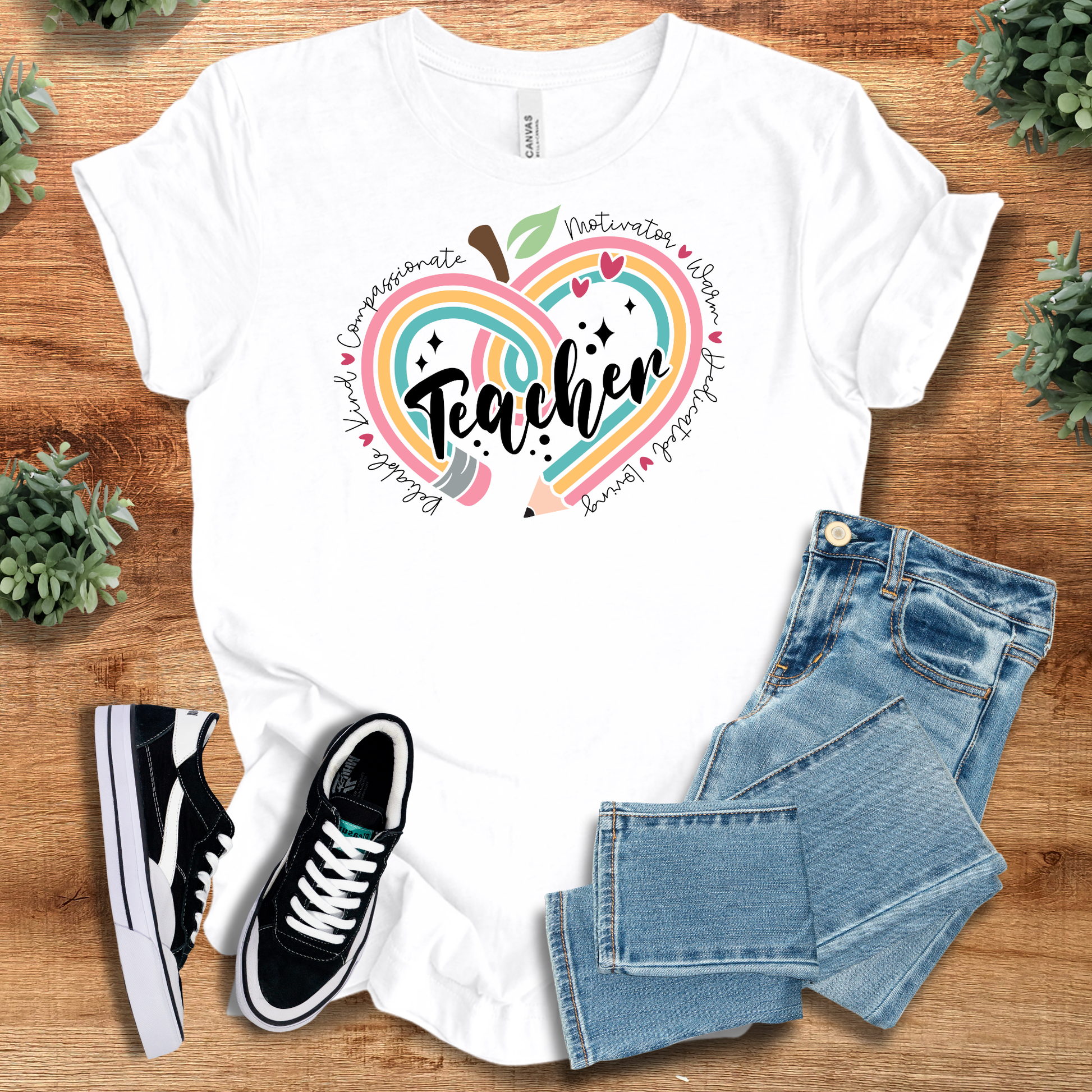 White Teacher Appreciation Gifts T-Shirt with colorful heart-apple graphic and motivational words. Made from 100% cotton, ideal for educators.
